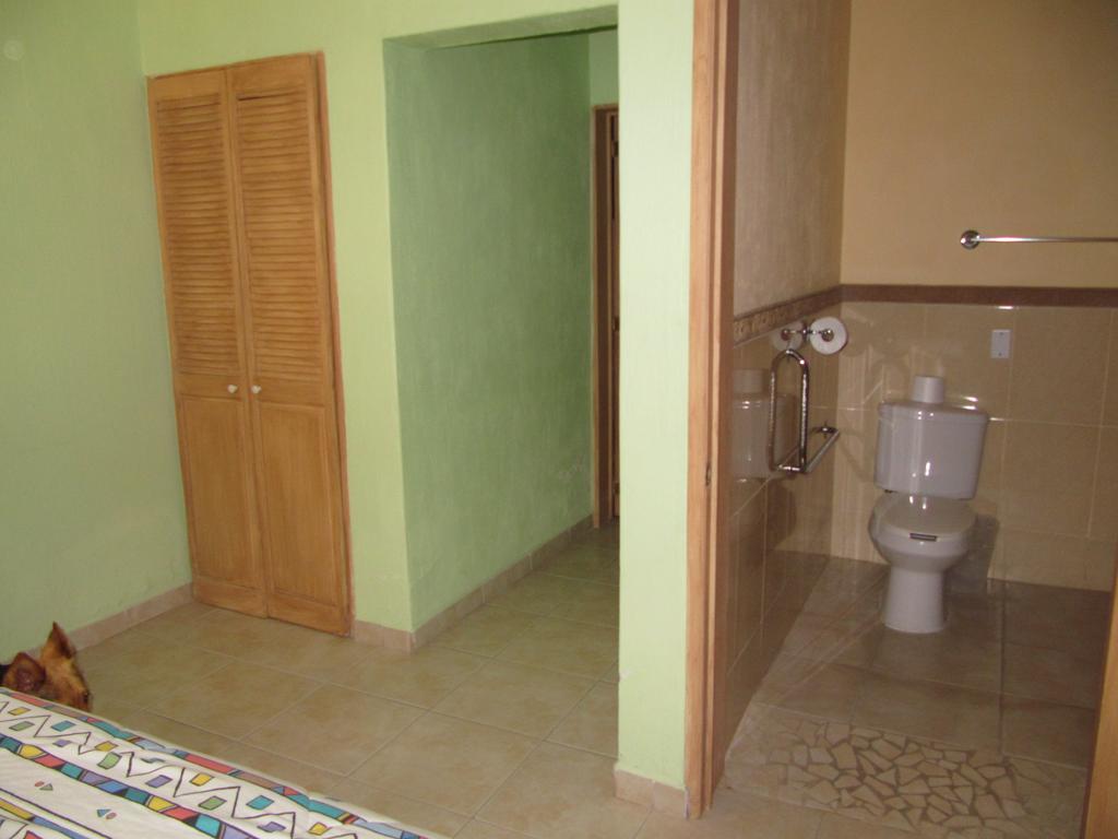 La Puerta Violeta Guesthouse & Spa San Juan Cosala Ruang foto