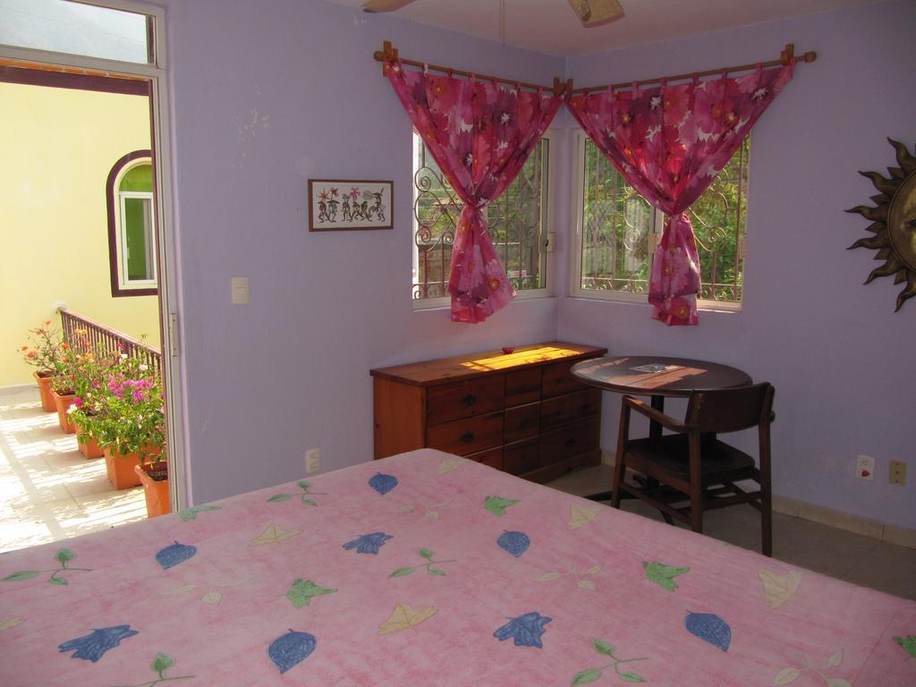 La Puerta Violeta Guesthouse & Spa San Juan Cosala Ruang foto