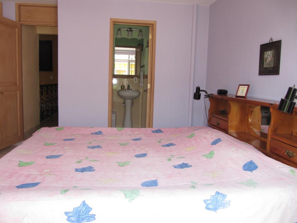 La Puerta Violeta Guesthouse & Spa San Juan Cosala Ruang foto
